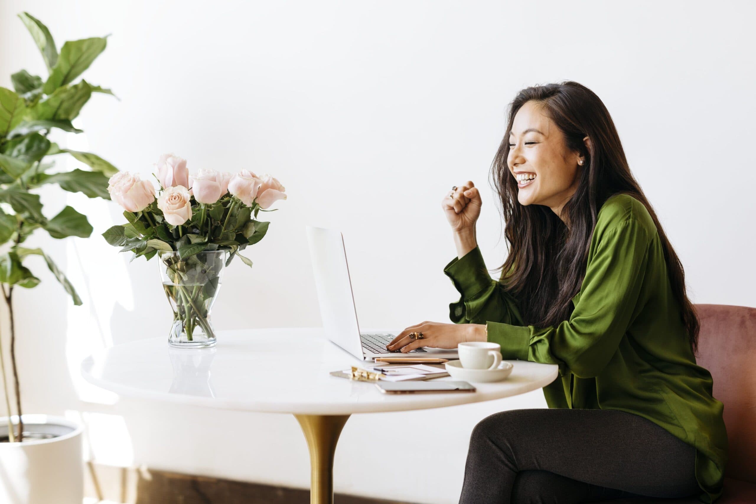 Woman smiling while working at a desk